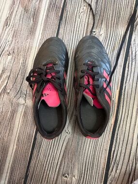 adidas Black and Pink Soccer Cleats with Lace-Up Closure